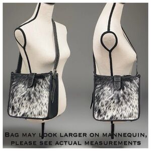 MONTANA WEST Trinity Ranch Hair-On
Cowhide Floral Tooled Shoulder Bag